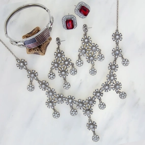 1928 Jewelry $200 Value Mystery Jewelry Package One Necklace, Two Earrings and One Bracelet